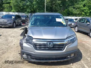 2020 Honda Ridgeline RTL with VIN 5FPYK3F5XLB025857, listed as a IAAI auction lot 42307343 with 97,262 mi miles and . Bid and sale history available at DreamBid. Image 12.