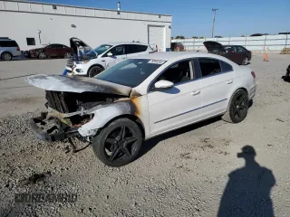 2010 Volkswagen CC Sport with VIN WVWNN7AN8AE532255, listed as a Copart auction lot 76564264 with 0 mi miles and Salvage Title. Bid and sale history available at carsss.com. Image 1.