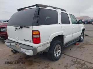 2002 Chevrolet Tahoe Z71 with VIN 1GNEK13Z22R303223, listed as a IAAI auction lot 41527148 with 211,835 mi miles. Bid and sale history available at carsss.com. Image 4.