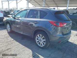 2014 Mazda CX-5 Grand Touring with VIN JM3KE2DY7E0405115, listed as a IAAI auction lot 41939899 with 147,452 mi miles. Bid and sale history available at carsss.com. Image 3.