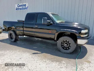 2002 Chevrolet Silverado 1500 LS with VIN 1GCEK19T12Z257038, listed as a Copart auction lot 56856265 with 205,764 mi miles and Clean Title. Bid and sale history available at DreamBid. Image 4.