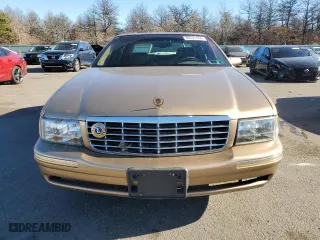 1998 Cadillac DeVille DHS with VIN 1G6KE54Y5WU711754, listed as a Copart auction lot 80521654 with 59,044 mi miles and Clean Title. Bid and sale history available at carsss.com. Image 5.