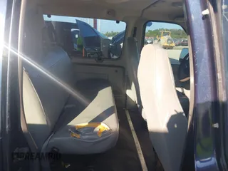 2003 Ford Econoline Passenger XL with VIN 1FMRE11233HB49745, listed as a IAAI auction lot 41558890 with 204,693 mi miles and . Bid and sale history available at DreamBid. Image 8.