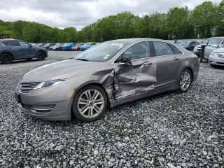 2015 Lincoln MKZ z VIN 3LN6L2J9XFR622989, wystawiony jako Copart lot #58037965 z przebiegiem 81 709 mil mil oraz Szkoda całkowita • Salvage title. Historia ofert i sprzedaży dostępna na DreamBid. Obrazek 1.