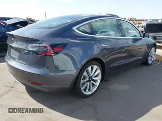 2018 Tesla Model 3 Long Range Battery with VIN 5YJ3E1EA5JF169097, listed as a IAAI auction lot 41916873 with 81,919 mi miles. Bid and sale history available at carsss.com. Image 4.