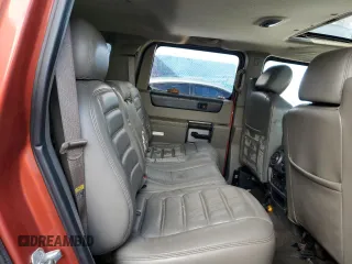 2003 Hummer H2 with VIN 5GRGN23U73H141713, listed as a Copart auction lot 84285624 with 152,719 mi miles and Non Repairable. Bid and sale history available at carsss.com. Image 11.