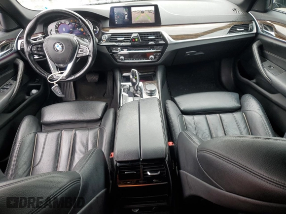 2019 BMW 5 Series 540i xDrive with VIN WBAJE7C54KWW19994, listed as a Copart auction lot 57973055 with 121,995 mi miles and Salvage title. Bid and sale history available at DreamBid. Image 8.