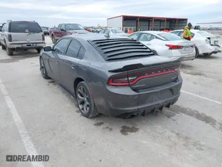 2015 Dodge Charger SXT with VIN 2C3CDXHG2FH825350, listed as a IAAI auction lot 41518230 with 147,232 mi miles. Bid and sale history available at carsss.com. Image 3.