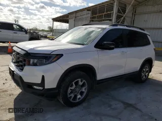 2023 Honda Passport TrailSport z VIN 5FNYF8H6XPB026464, wystawiony jako Copart lot #52736395 z przebiegiem 14 281 mil mil oraz Szkoda całkowita • Salvage title. Historia ofert i sprzedaży dostępna na DreamBid. Obrazek 1.