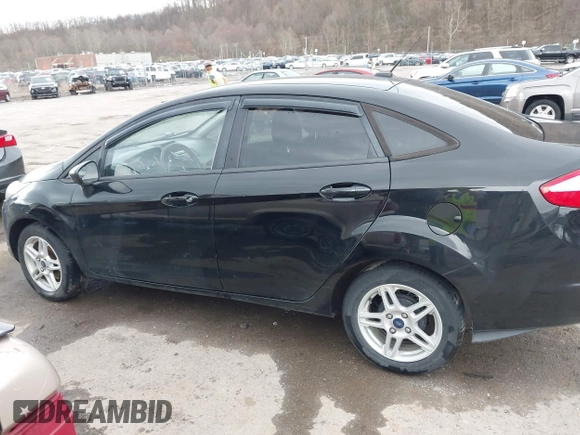 2018 Ford Fiesta SE with VIN 3FADP4BJ1JM134319, listed as a IAAI auction lot 41900382 with 113,555 mi miles and . Bid and sale history available at DreamBid. Image 14.
