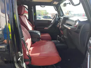 2011 Jeep Wrangler Unlimited Rubicon with VIN 1J4BA6H13BL513311, listed as a IAAI auction lot 41809207 with 124,716 mi miles and . Bid and sale history available at DreamBid. Image 5.