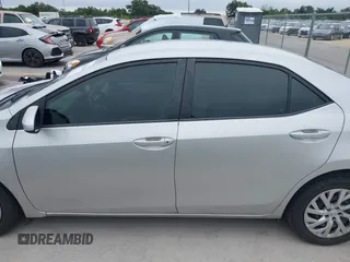 2018 Toyota Corolla L z VIN 5YFBURHE7JP822870, wystawiony jako IAAI lot #42318344 z przebiegiem 118 519 mil mil oraz . Historia ofert i sprzedaży dostępna na DreamBid. Obrazek 14.