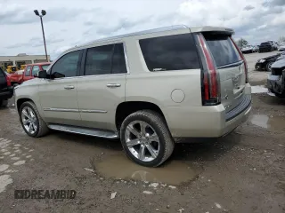 2015 Cadillac Escalade z VIN 1GYS4AKJ1FR100437, wystawiony jako Copart lot #52559965 z przebiegiem 51 627 mil mil oraz Tytuł czysty. Historia ofert i sprzedaży dostępna na DreamBid. Obrazek 2.