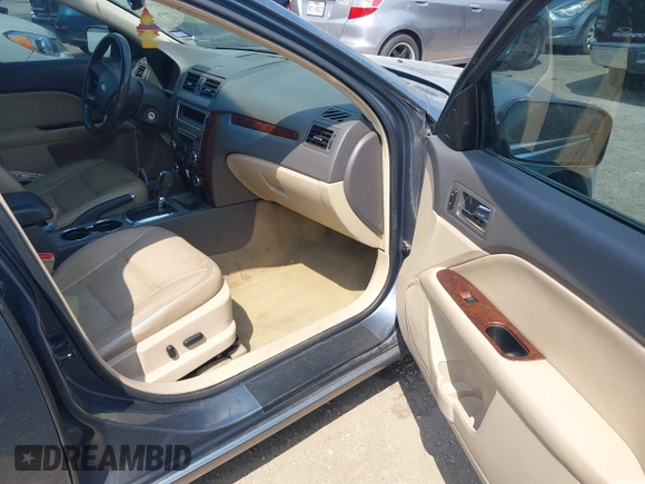 2012 Ford Fusion SEL z VIN 3FAHP0JG3CR286320, wystawiony jako IAAI lot #42159555 z przebiegiem 184 128 mil mil oraz . Historia ofert i sprzedaży dostępna na DreamBid. Obrazek 5.