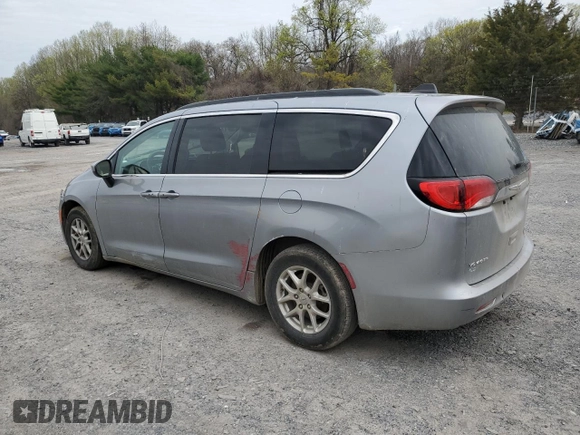 2021 Chrysler Voyager LXi with VIN 2C4RC1DG0MR521145, listed as a Copart auction lot 48062405 with 144,197 mi miles and Salvage Title. Bid and sale history available at DreamBid. Image 2.