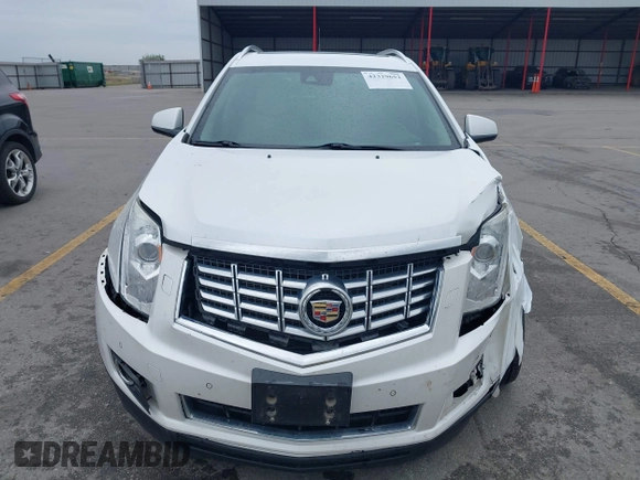 2013 Cadillac SRX Performance Collection z VIN 3GYFNHE35DS569528, wystawiony jako IAAI lot #42329652 z przebiegiem 97 184 mil mil oraz . Historia ofert i sprzedaży dostępna na DreamBid. Obrazek 12.