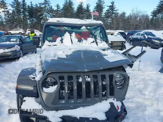 2020 Jeep Wrangler Unlimited Rubicon z VIN 1C4HJXFN5LW176104, wystawiony jako IAAI lot #41332511 z przebiegiem 70 428 mil mil oraz . Historia ofert i sprzedaży dostępna na DreamBid. Obrazek 13.