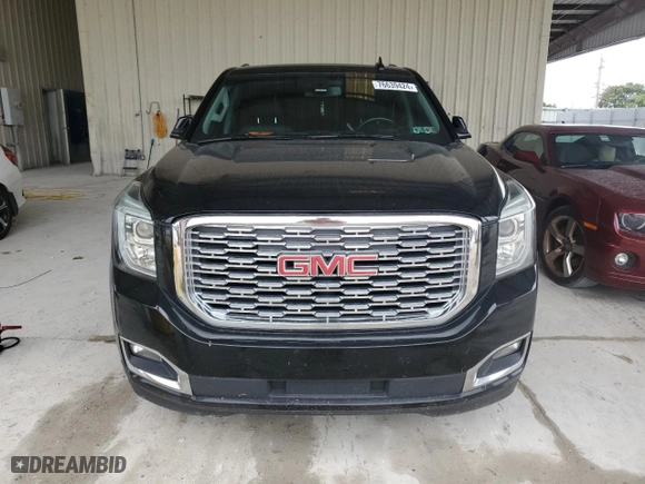 2020 GMC Yukon XL Denali with VIN 1GKS1HKJ6LR127236, listed as a Copart auction lot 51928885 with 143,579 mi miles and Salvage Title. Bid and sale history available at carsss.com. Image 5.
