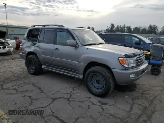 2004 Toyota Land Cruiser with VIN JTEHT05J242065384, listed as a Copart auction lot 83311194 with 132,495 mi miles and Salvage Title. Bid and sale history available at carsss.com. Image 4.