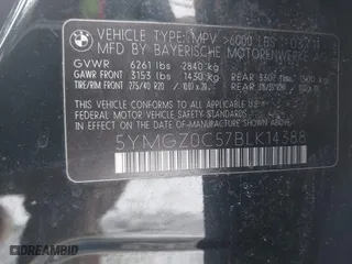 2011 BMW X6 M with VIN 5YMGZ0C57BLK14388, listed as a IAAI auction lot 41411854 with 129,248 mi miles. Bid and sale history available at carsss.com. Image 9.