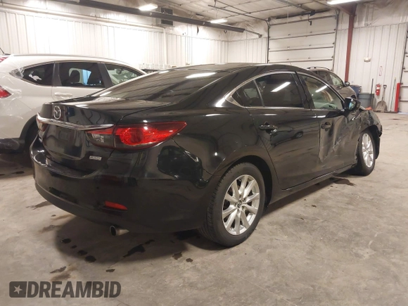 2016 Mazda 6 i Sport with VIN JM1GJ1U57G1433732, listed as a IAAI auction lot 41879844 with 107,269 mi miles and . Bid and sale history available at DreamBid. Image 4.