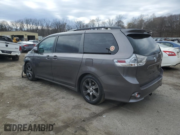 2012 Toyota Sienna SE z VIN 5TDXK3DC2CS199701, wystawiony jako Copart lot #50316225 z przebiegiem 212 383 mil mil oraz Szkoda całkowita • Salvage title. Historia ofert i sprzedaży dostępna na DreamBid. Obrazek 2.