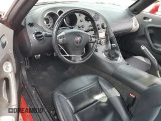 2008 Pontiac Solstice z VIN 1G2MB35B88Y107998, wystawiony jako Copart lot #49872315 z przebiegiem 70 788 mil mil oraz Czysty tytuł • Clean title. Historia ofert i sprzedaży dostępna na DreamBid. Obrazek 8.