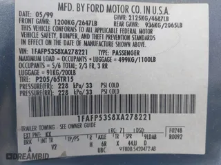1999 Ford Taurus SE with VIN 1FAFP53S8XA278221, listed as a IAAI auction lot 41820964 with 115,109 mi miles. Bid and sale history available at carsss.com. Image 9.