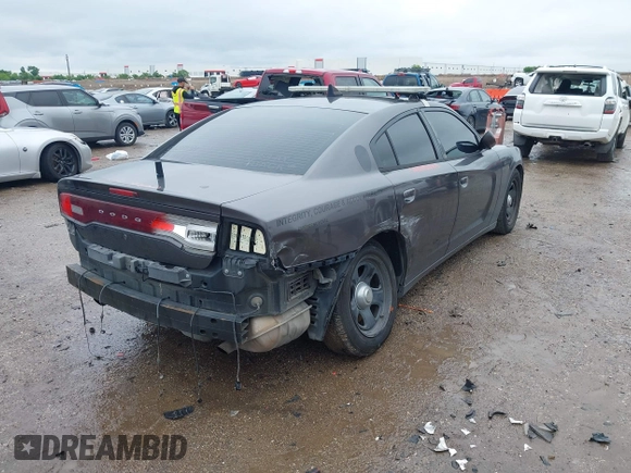 2013 Dodge Charger Police z VIN 2C3CDXAT4DH521778, wystawiony jako IAAI lot #42169438 z przebiegiem 191 907 mil mil oraz . Historia ofert i sprzedaży dostępna na DreamBid. Obrazek 4.