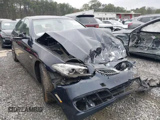 2015 BMW 5 Series 528i with VIN WBA5A5C55FD516330, listed as a IAAI auction lot 41622021 with 140,455 mi miles. Bid and sale history available at carsss.com. Image 1.