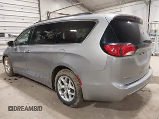 2017 Chrysler Pacifica Touring L with VIN 2C4RC1BG7HR831320, listed as a IAAI auction lot 41805697 with 137,743 mi miles and . Bid and sale history available at DreamBid. Image 3.
