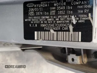 2012 Hyundai Accent SE z VIN KMHCU5AE7CU004256, wystawiony jako Copart lot #54447155 z przebiegiem 179 954 mil mil oraz Czysty tytuł • Clean title. Historia ofert i sprzedaży dostępna na DreamBid. Obrazek 12.