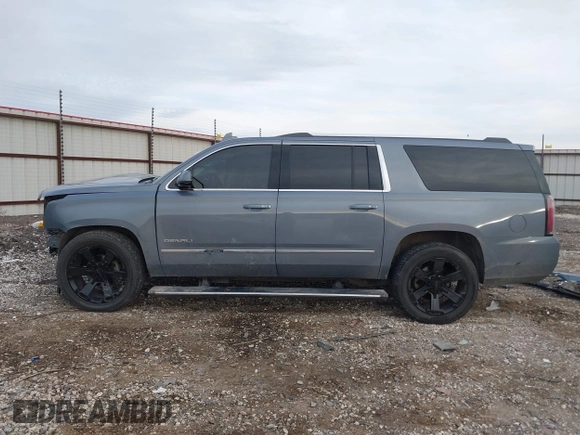 2015 GMC Yukon XL Denali with VIN 1GKS2JKJ3FR616122, listed as a IAAI auction lot 41415642 with Not Provided miles and . Bid and sale history available at DreamBid. Image 15.