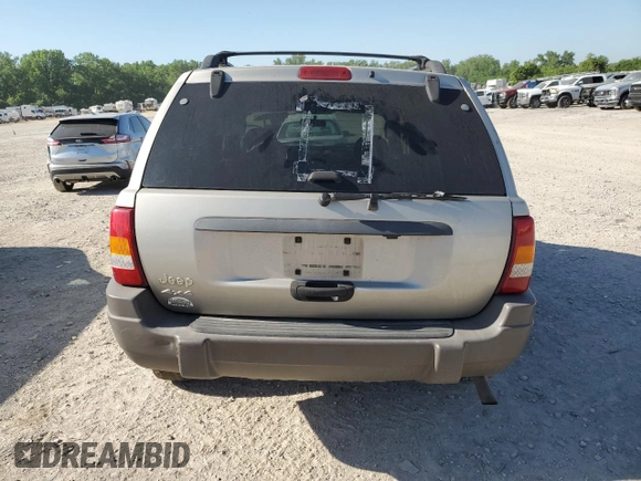 2004 Jeep Grand Cherokee Laredo with VIN 1J4GW48S34C307347, listed as a Copart auction lot 55749565 with Not provided miles and Salvage title. Bid and sale history available at DreamBid. Image 6.