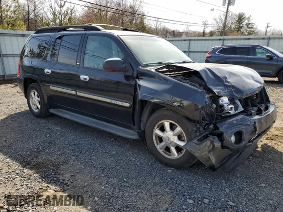 2003 GMC Envoy SLT z VIN 1GKET16PX36243554, wystawiony jako Copart lot #49083975 z przebiegiem 148 596 mil mil oraz Szkoda całkowita • Salvage title. Historia ofert i sprzedaży dostępna na DreamBid. Obrazek 4.