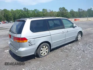 2002 Honda Odyssey EX z VIN 2HKRL18692H526842, wystawiony jako IAAI lot #42495810 z przebiegiem 220 289 mil mil oraz . Historia ofert i sprzedaży dostępna na DreamBid. Obrazek 4.