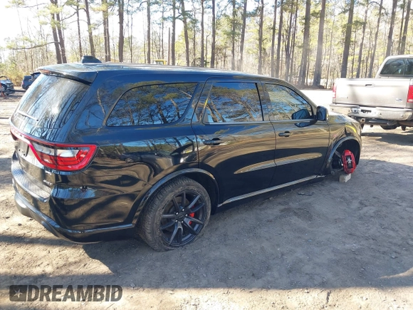 2018 Dodge Durango SRT with VIN 1C4SDJGJ6JC416538, listed as a IAAI auction lot 41440038 with 67,650 mi miles and . Bid and sale history available at DreamBid. Image 4.