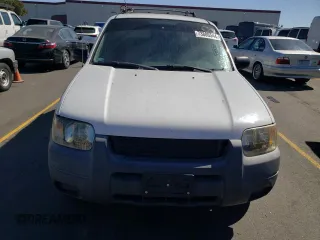 2004 Ford Escape XLS with VIN 1FMYU02184DA20455, listed as a Copart auction lot 73806544 with 322,565 mi miles and Clean Title. Bid and sale history available at DreamBid. Image 5.