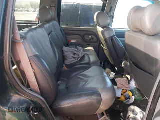 2000 GMC Denali with VIN 1GKEK13R6YR146253, listed as a Copart auction lot 44381765 with 264,950 mi miles and Salvage Title. Bid and sale history available at DreamBid. Image 11.