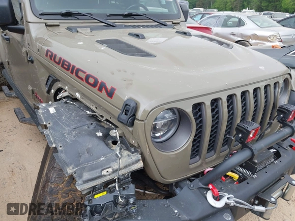 2020 Jeep Gladiator Rubicon z VIN 1C6JJTBG6LL179541, wystawiony jako IAAI lot #42050510 z przebiegiem 52 784 mil mil oraz . Historia ofert i sprzedaży dostępna na DreamBid. Obrazek 6.