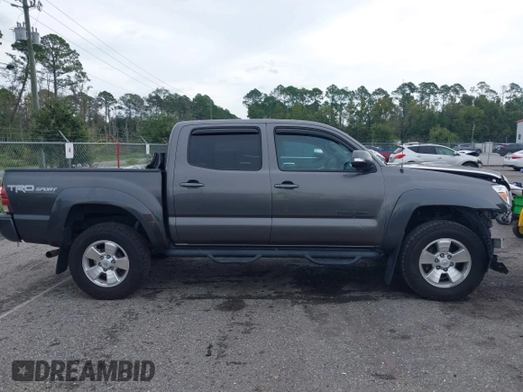 2014 Toyota Tacoma with VIN 5TFLU4EN9EX099414, listed as a IAAI auction lot 40528514 with 122,827 mi miles. Bid and sale history available at carsss.com. Image 12.