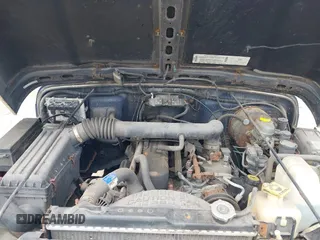 2002 Jeep Wrangler X z VIN 1J4FA39S82P735794, wystawiony jako IAAI lot #42411386 z przebiegiem 141 219 mil mil oraz . Historia ofert i sprzedaży dostępna na DreamBid. Obrazek 10.