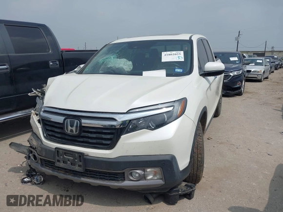 2018 Honda Ridgeline RTL-E with VIN 5FPYK3F77JB004379, listed as a IAAI auction lot 41802025 with 132,085 mi miles and . Bid and sale history available at DreamBid. Image 17.