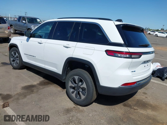 2022 Jeep Grand Cherokee with VIN 1C4RJYB66N8718018, listed as a IAAI auction lot 42002051 with Not provided miles and . Bid and sale history available at DreamBid. Image 3.