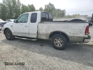 1998 Ford F-150 with VIN 2FTZX1766WCA27840, listed as a Copart auction lot 56186495 with 147,127 mi miles and Clean title. Bid and sale history available at DreamBid. Image 2.