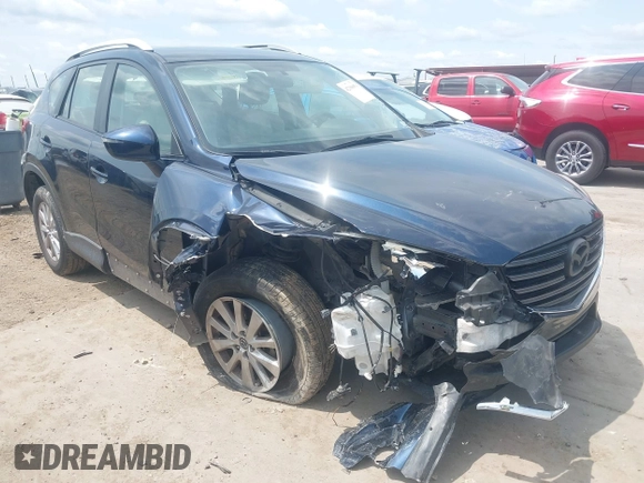 2016 Mazda CX-5 Sport z VIN JM3KE2BY0G0633611, wystawiony jako IAAI lot #42390654 z przebiegiem Nie podano mil oraz . Historia ofert i sprzedaży dostępna na DreamBid. Obrazek 1.