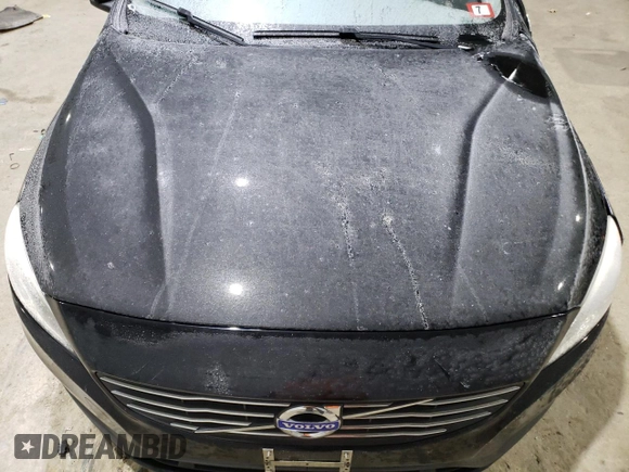 2015 Volvo S60 T5 Premier z VIN YV1612TK1F2332441, wystawiony jako Copart lot #89086705 z przebiegiem Nie podano mil oraz Szkoda całkowita • Salvage title. Historia ofert i sprzedaży dostępna na DreamBid. Obrazek 11.