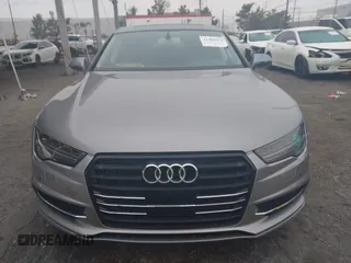 2016 Audi A7 3.0 Premium Plus with VIN WAUWGAFC0GN003357, listed as a IAAI auction lot 41468854 with 62,590 mi miles. Bid and sale history available at carsss.com. Image 12.