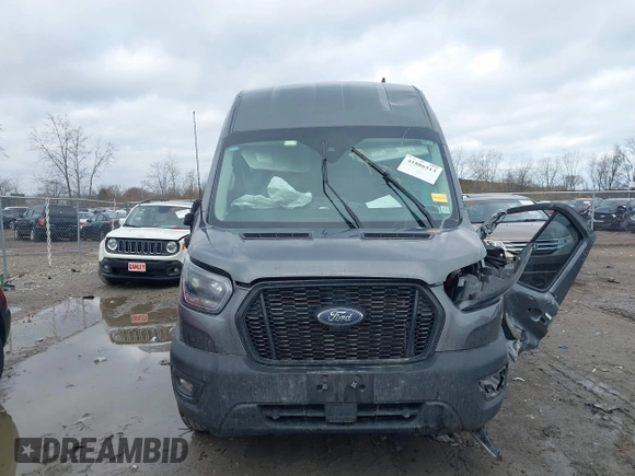 2023 Ford Transit Cargo z VIN 1FTBW3X86PKC01923, wystawiony jako IAAI lot #41886513 z przebiegiem 148 658 mil mil oraz . Historia ofert i sprzedaży dostępna na DreamBid. Obrazek 12.