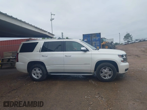 2015 Chevrolet Tahoe LTZ with VIN 1GNSCCKC1FR265370, listed as a IAAI auction lot 42131294 with 217,064 mi miles and . Bid and sale history available at DreamBid. Image 13.